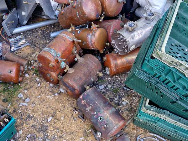 Copper hot water cylinders collected and sorted for recycling