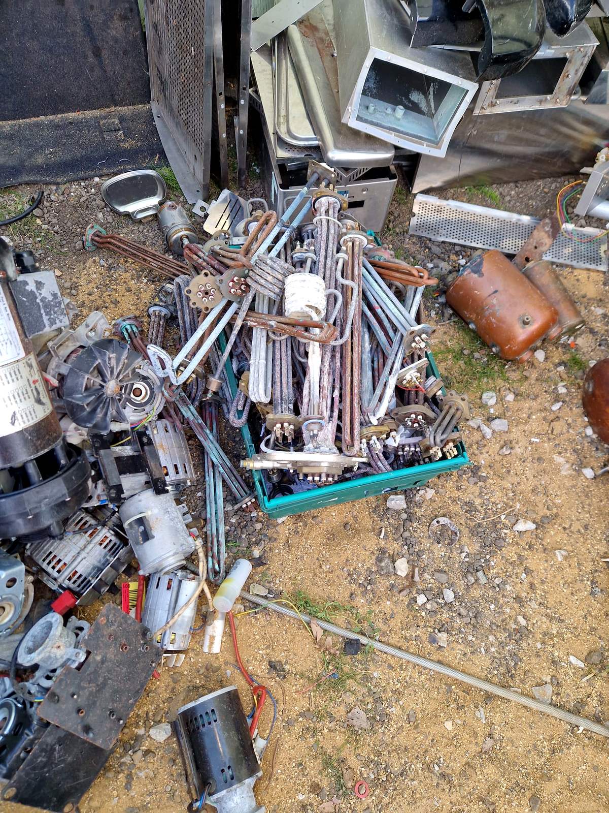 Sorted electric motors alongside brass and copper pipework