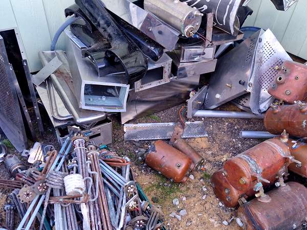 Stainless steel, copper cylinders and mixed metals sorted into grades